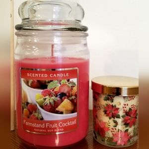 2 candles. The larger is fruit cocktail. The smaller is holiday scented.